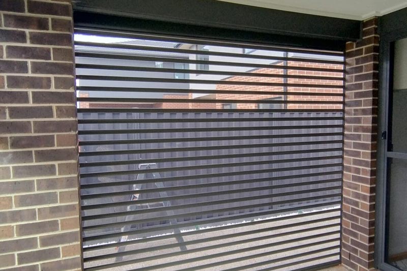 Large roller shutter on commercial warehouse building