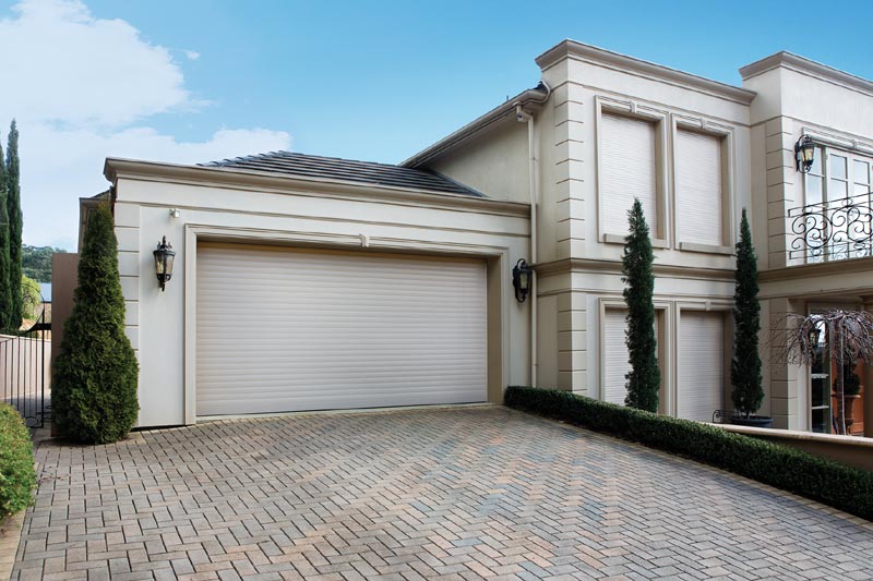 Wide roller shutter doors on garage and industrial spaces
